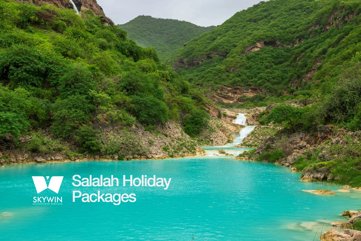Green mountain scenery and misty waterfalls during Khareef season in Salalah