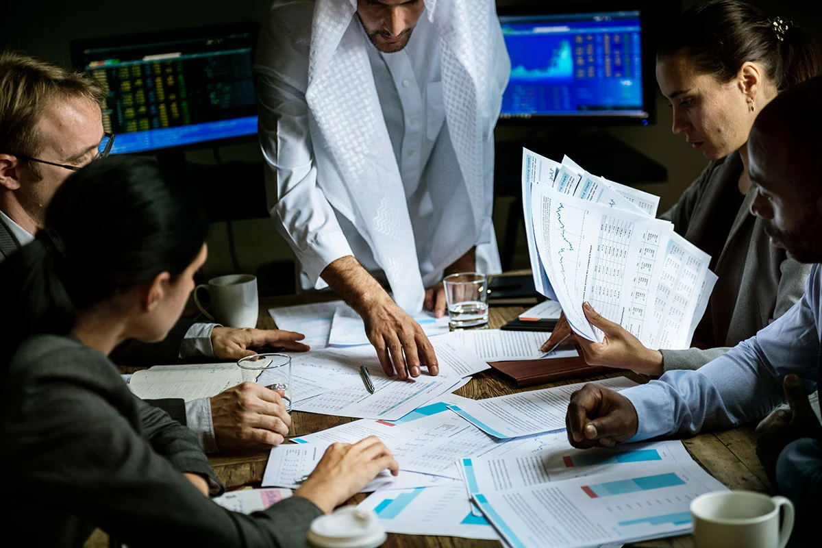 Skywin Business banking consultant reviewing corporate KYC documents with an entrepreneur